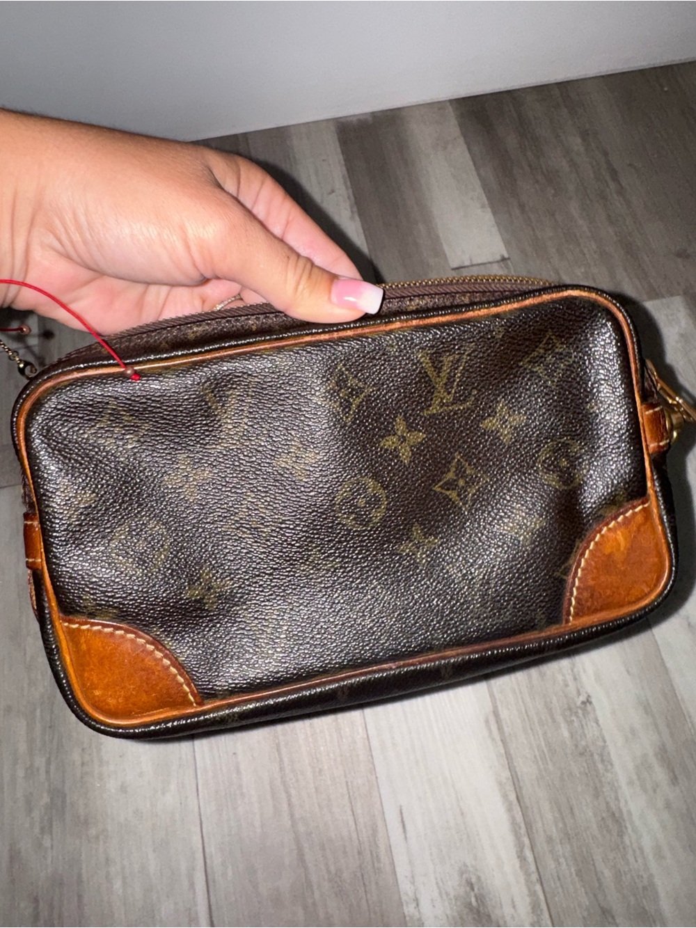 Louis Vuitton Monogram Canvas Wristlet with Brown Trim